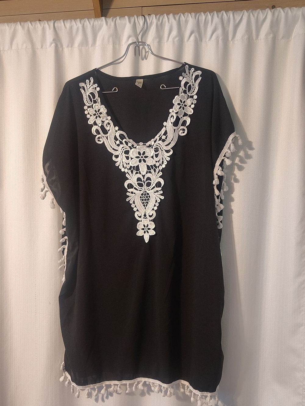 Black Tunic Top with White Embroidered V-Neck and Tassel Trim